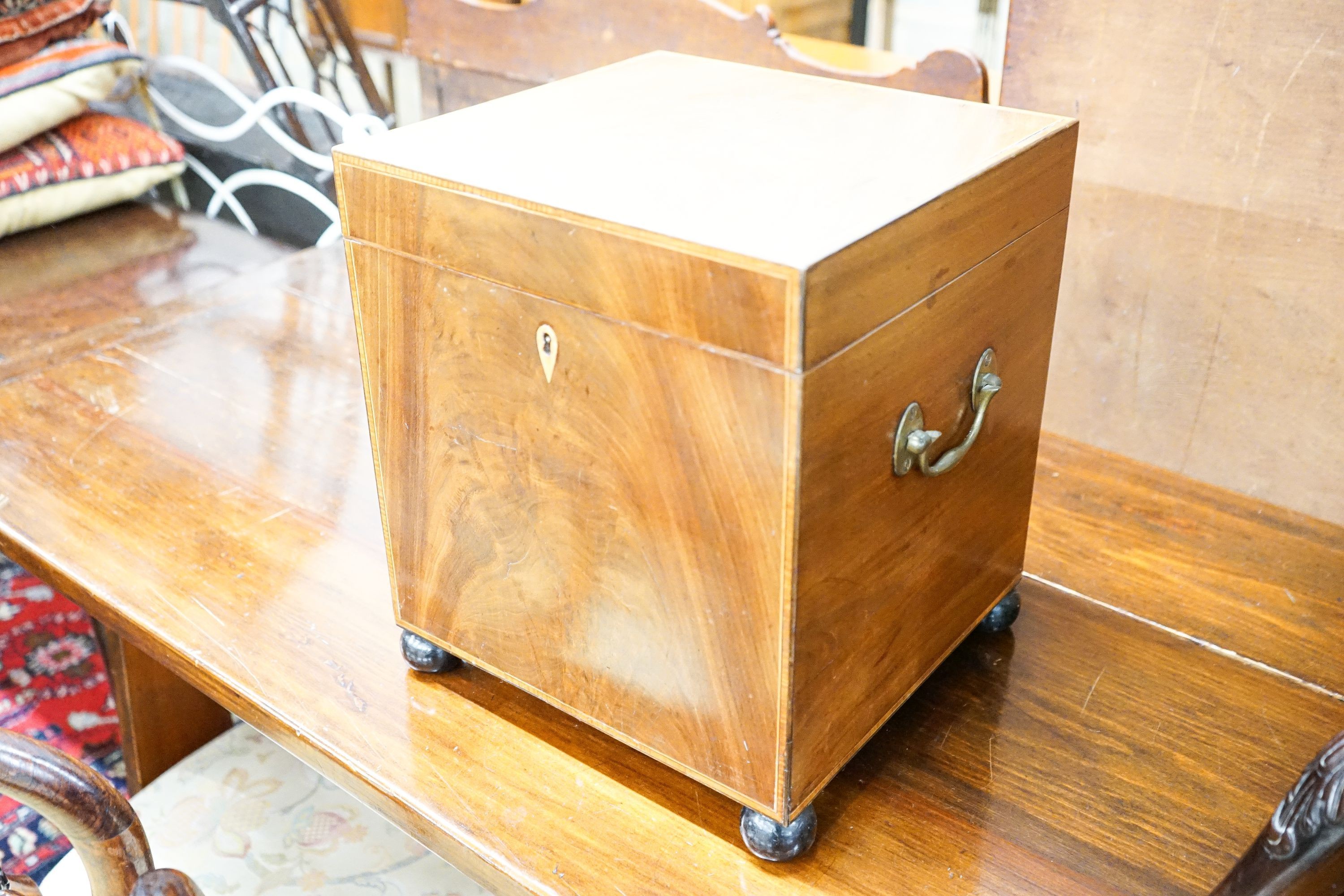 A small George III satinwood banded mahogany cellarette with divided interior, width 30cm, depth 29cm, height 35cm